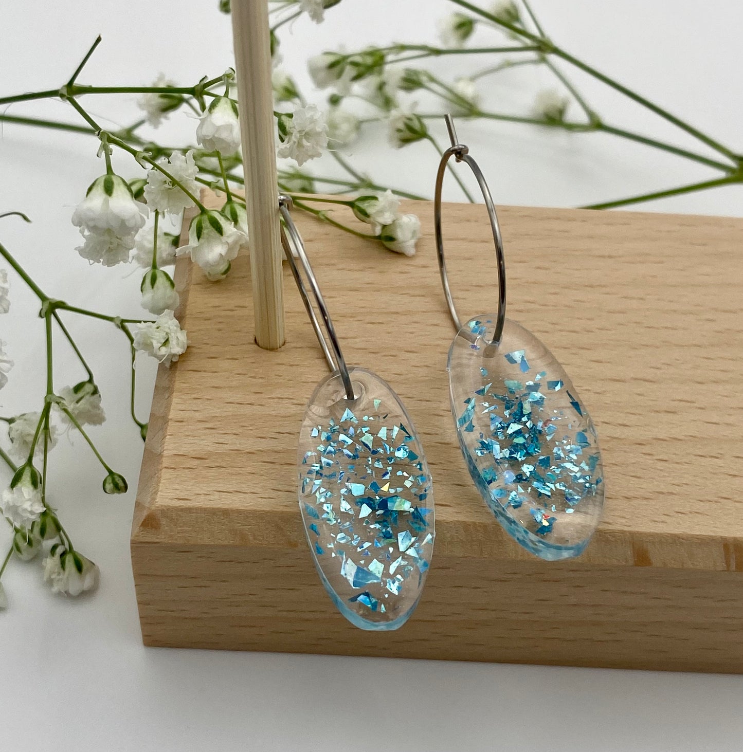 Blue Sparkle Medium Oval on Small Silver Hoop